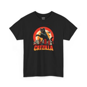 Catzilla T-Shirt - Vintage Japanese monster movie style graphic featuring a giant black and white tuxedo cat destroying a city skyline and swatting at biplanes against a red sun background. Text reads "CATZILLA" in distressed orange letters - Black