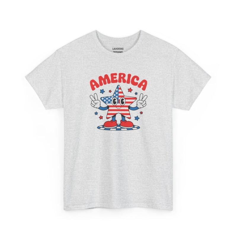 Retro 4th of July t-shirt design featuring a cartoon star with an American flag pattern throwing peace signs under bold red text reading "AMERICA", printed cleanly on a classic ash gray cotton shirt.