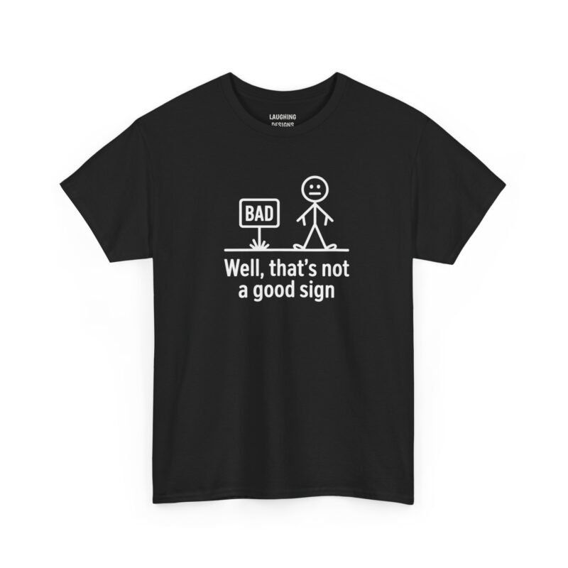 Funny t-shirt design with a stick figure standing near a sign labeled “BAD” above the text Well, that’s not a good sign, printed cleanly on a classic Black color cotton shirt.