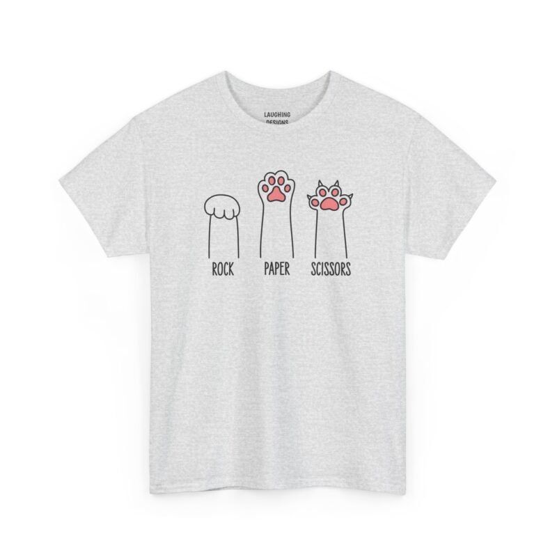 Funny minimalist t-shirt design featuring three drawn cat paws labeled ROCK (a closed paw), PAPER (an open paw with pads showing), and SCISSORS (an open paw with sharp claws extended), printed on a Ash Gray color cotton shirt.