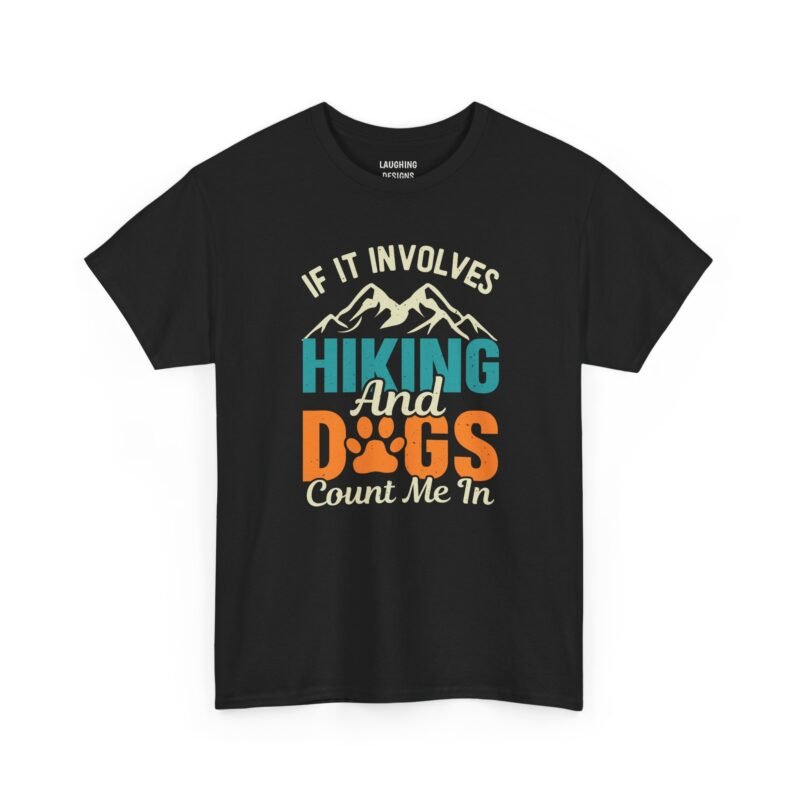 Funny outdoors t-shirt design featuring a mountain silhouette above the text "IF IT INVOLVES HIKING And DOGS Count Me In" in distressed retro teal, orange, and tan typography with a paw print in the word DOGS, printed on a Black color cotton shirt.
