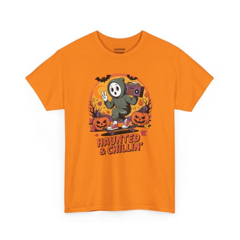 Funny t-shirt with a cartoon ghost in a hoodie riding a skateboard, carrying a purple boombox and throwing a peace sign, surrounded by jack-o'-lanterns, bats, and fall leaves against a retro orange moon, with orange text reading "HAUNTED & CHILLIN'", printed on a Safety Orange color cotton shirt.