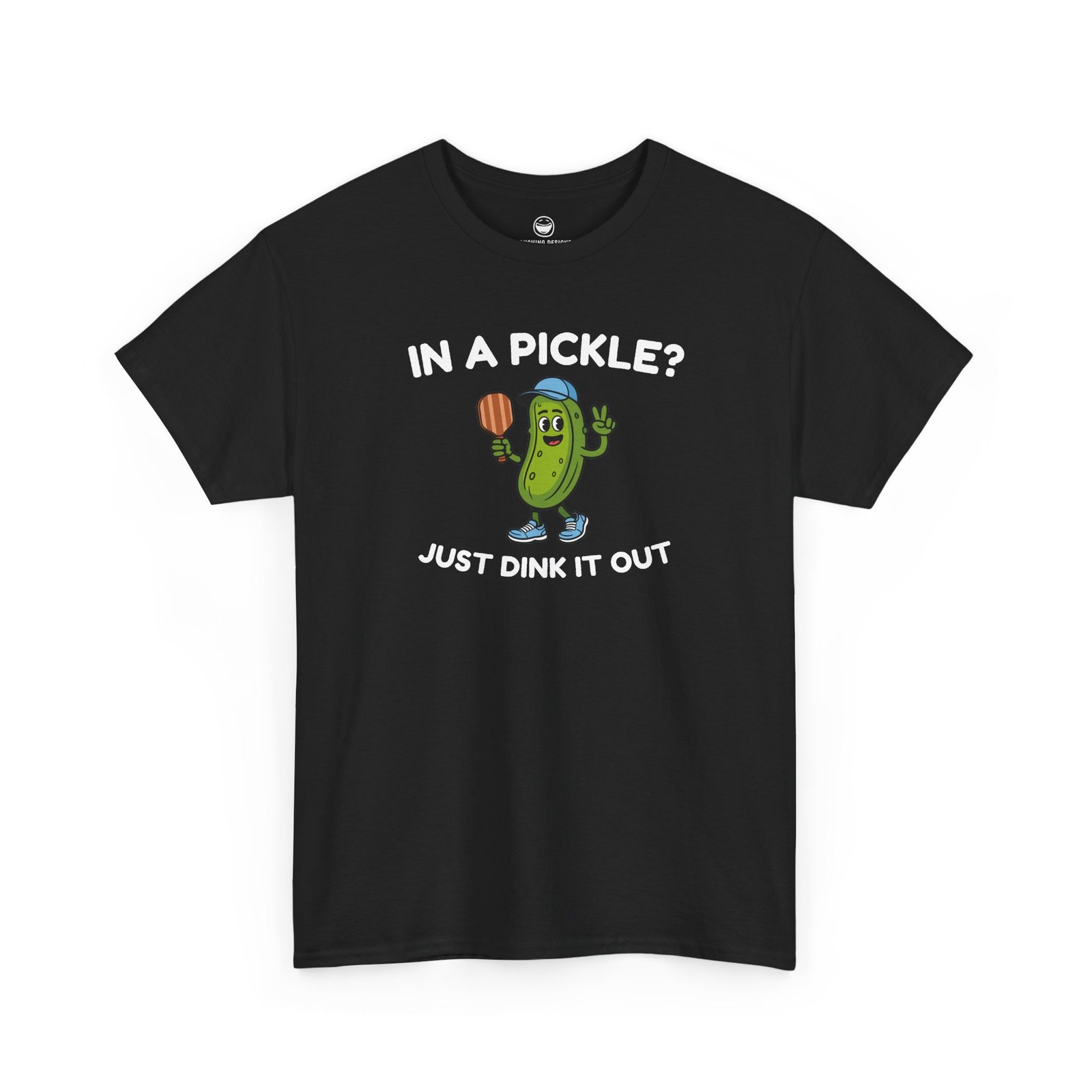Funny Pickleball T-Shirt with a cartoon pickle character wearing a cap and holding a paddle between text reading "IN A PICKLE? JUST DINK IT OUT", printed on a Black color cotton shirt.