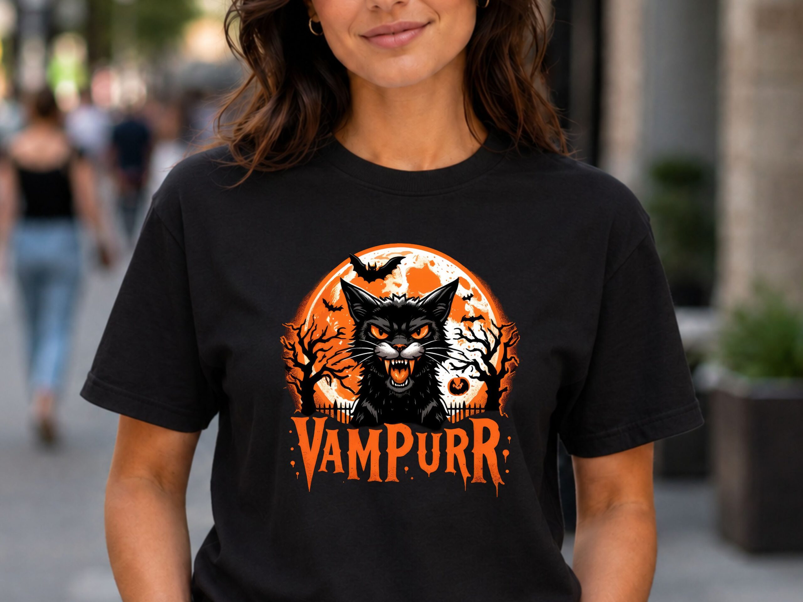 Woman wearing Vampurr T-Shirt with hissing vampire black cat and quote Vampurr on a Black cotton shirt.